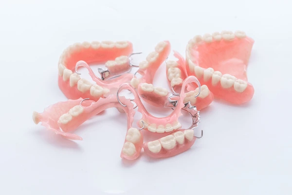 Partial dentures on a metal framework used to replace missing teeth at a Lubbock TX dental office